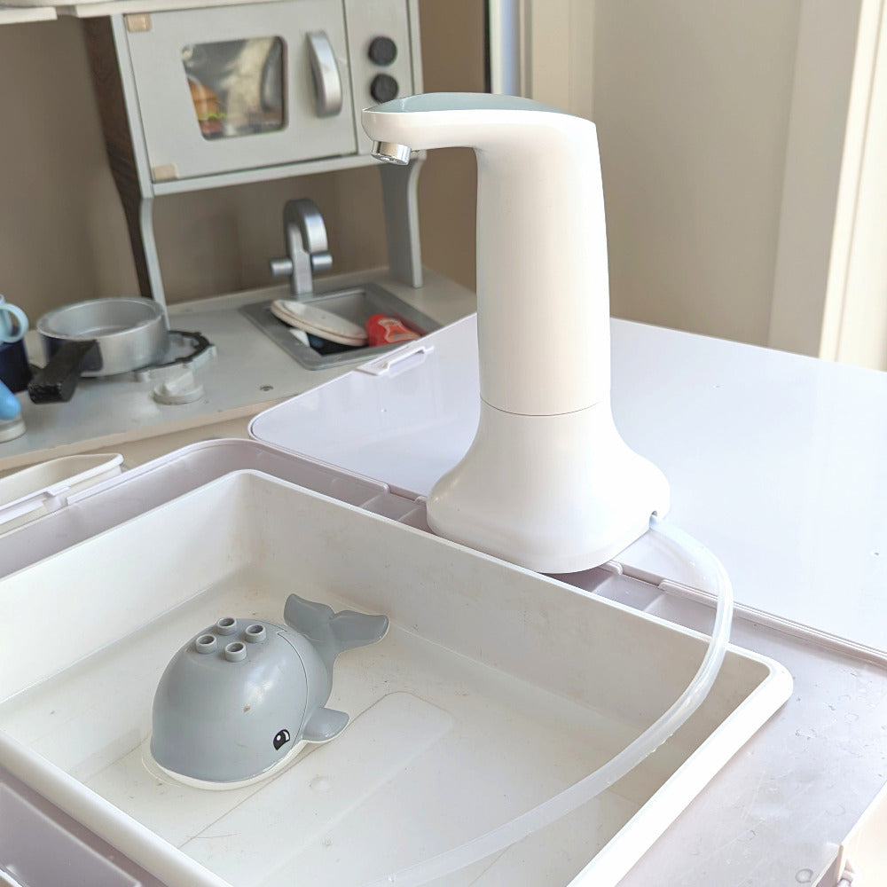 Water pump with base for kids table