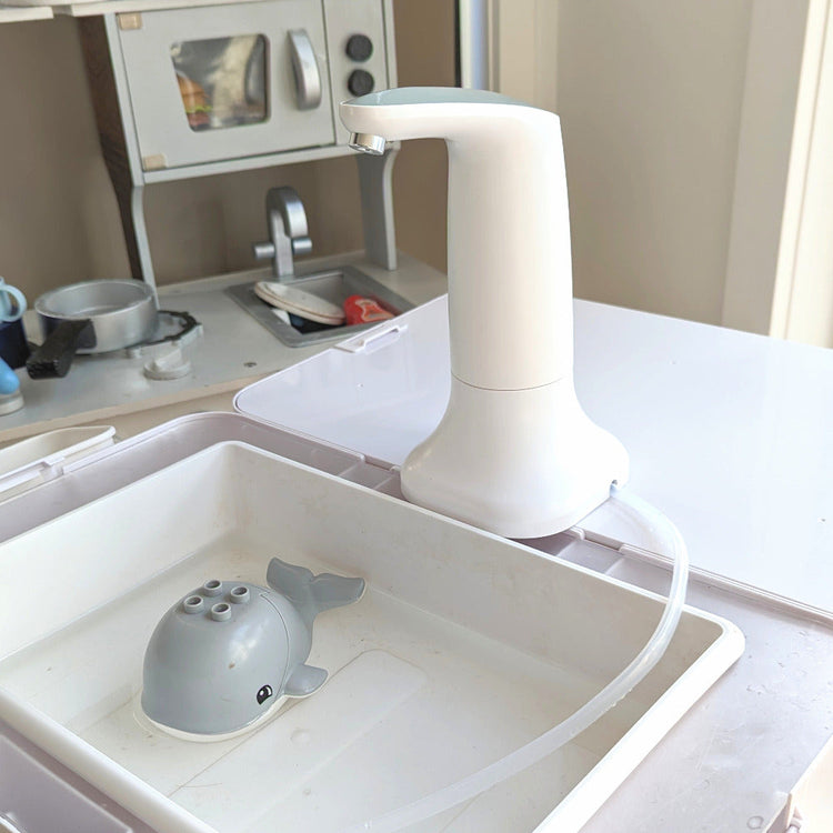 Water pump with base for kids table